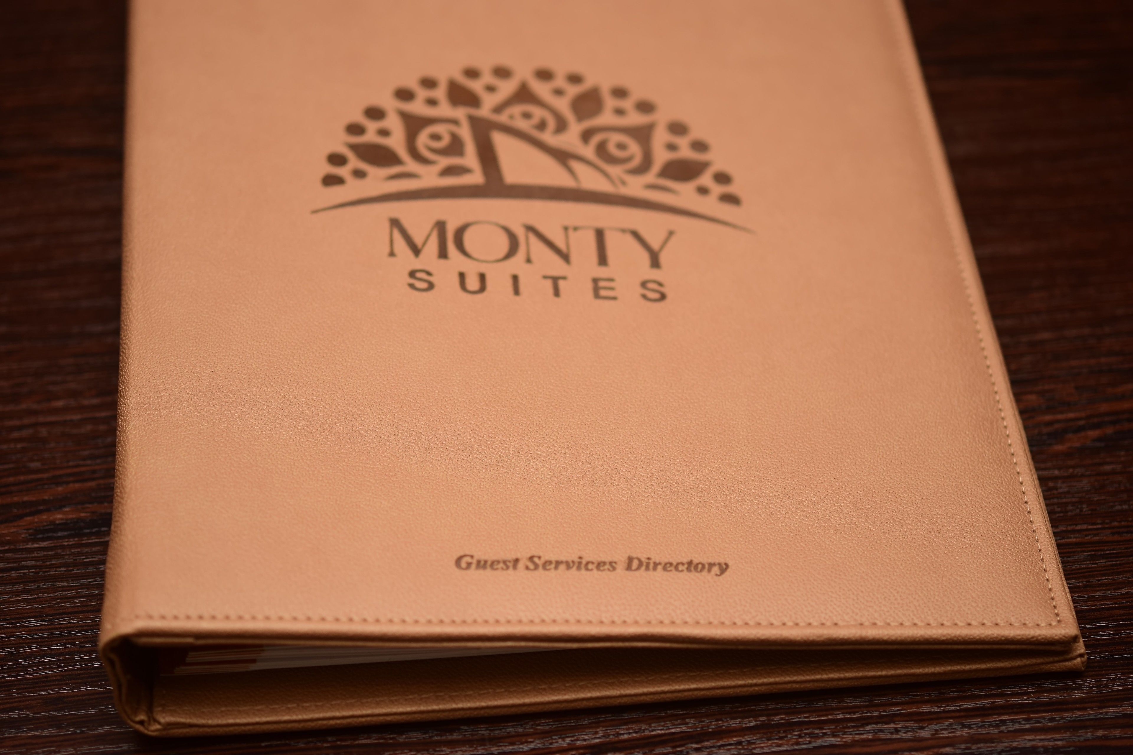 A closed guest services directory for Monty Suites.