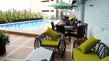 Outdoor pool, pool umbrellas, pool loungers