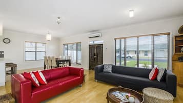 Luxury House, 3 Bedrooms, 2 Bathrooms, Garden View | Living room | Flat-screen TV, DVD player, iPod dock