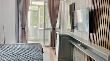 Kamar Triple | Seprai premium, selimut bulu angsa, busa memori, dan minibar