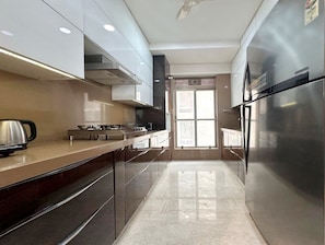 Premium Apartment, 3 Bedrooms | Private kitchen | Coffee/tea maker, electric kettle - Theory9 Premium Serviced Apartments Khar (Mumbai)