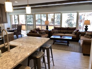 Smart TV, fireplace, table football, books