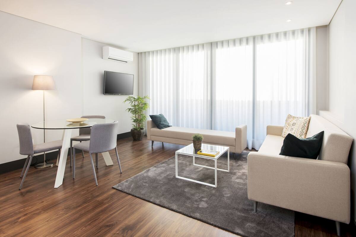 Superior Apartment, 1 Bedroom, Balcony, City View | Living area | 32-inch LCD TV with cable channels, TV