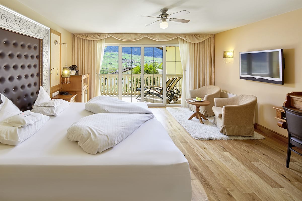 Luxury Suite, Mountain View | Premium bedding, minibar, in-room safe, desk