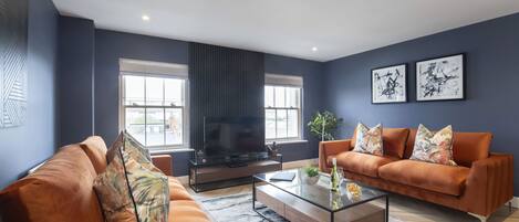 Standard Apartment, 3 Bedrooms | Living area | 36-inch flat-screen TV with digital channels, TV, Netflix