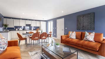 Standard Apartment, 3 Bedrooms | Living area | 36-inch flat-screen TV with digital channels, TV, Netflix