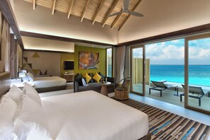 Premium bedding, minibar, in-room safe, individually decorated - Hard Rock Hotel Maldives (Emboodhoo Lagoon)