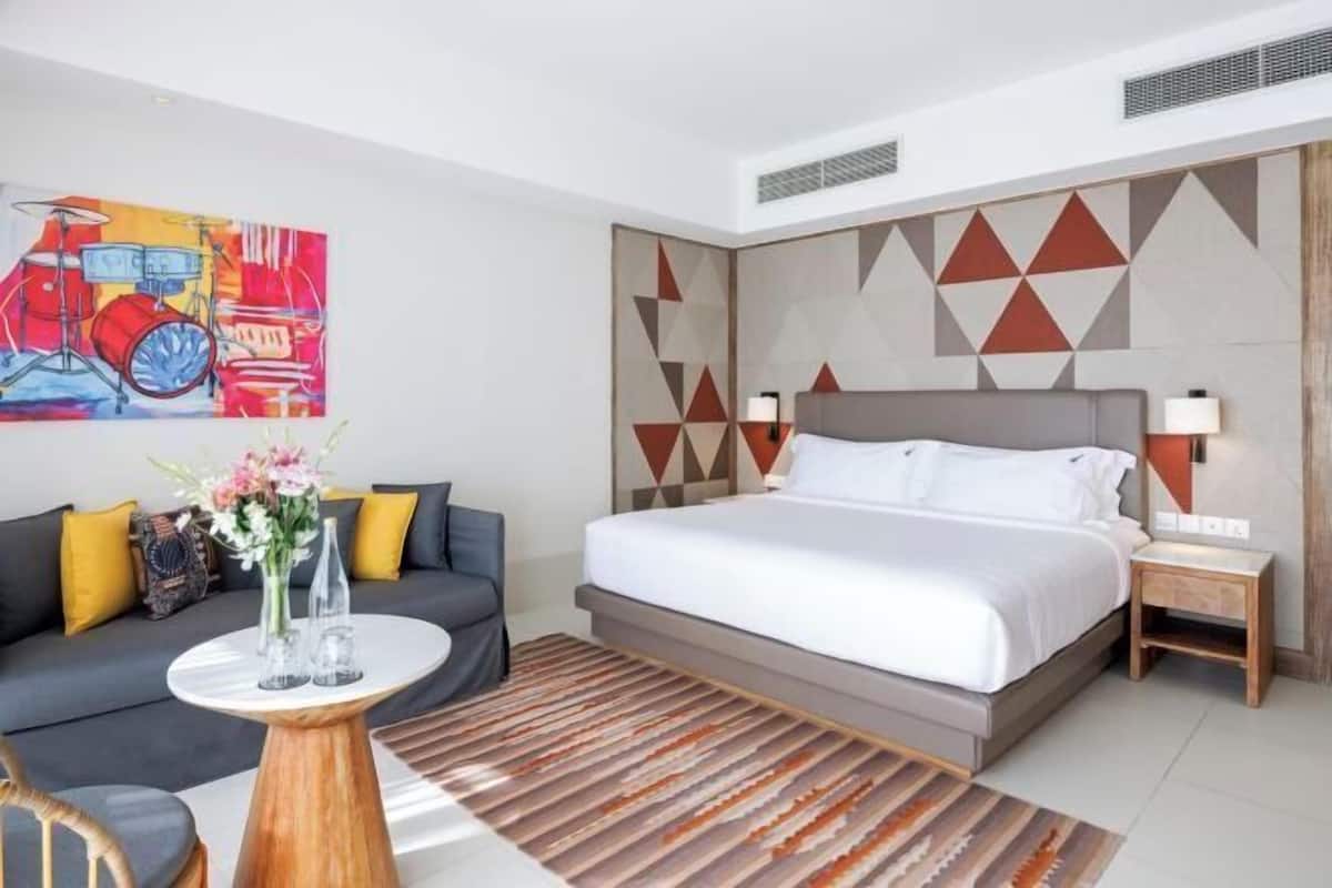 Ropa de cama de alta calidad, minibar, caja fuerte