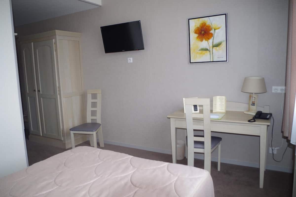 Desk, blackout drapes, iron/ironing board (on request), cribs (free)