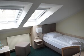 Desk, blackout curtains, soundproofing, rollaway beds