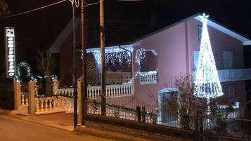 Front of property - evening/night