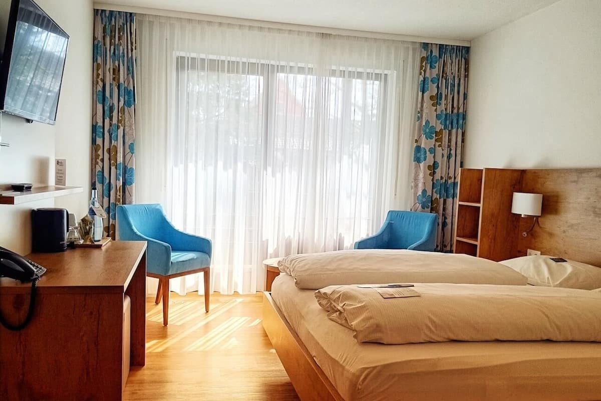 1 habitación, ropa de cama hipoalergénica y muebles diferentes