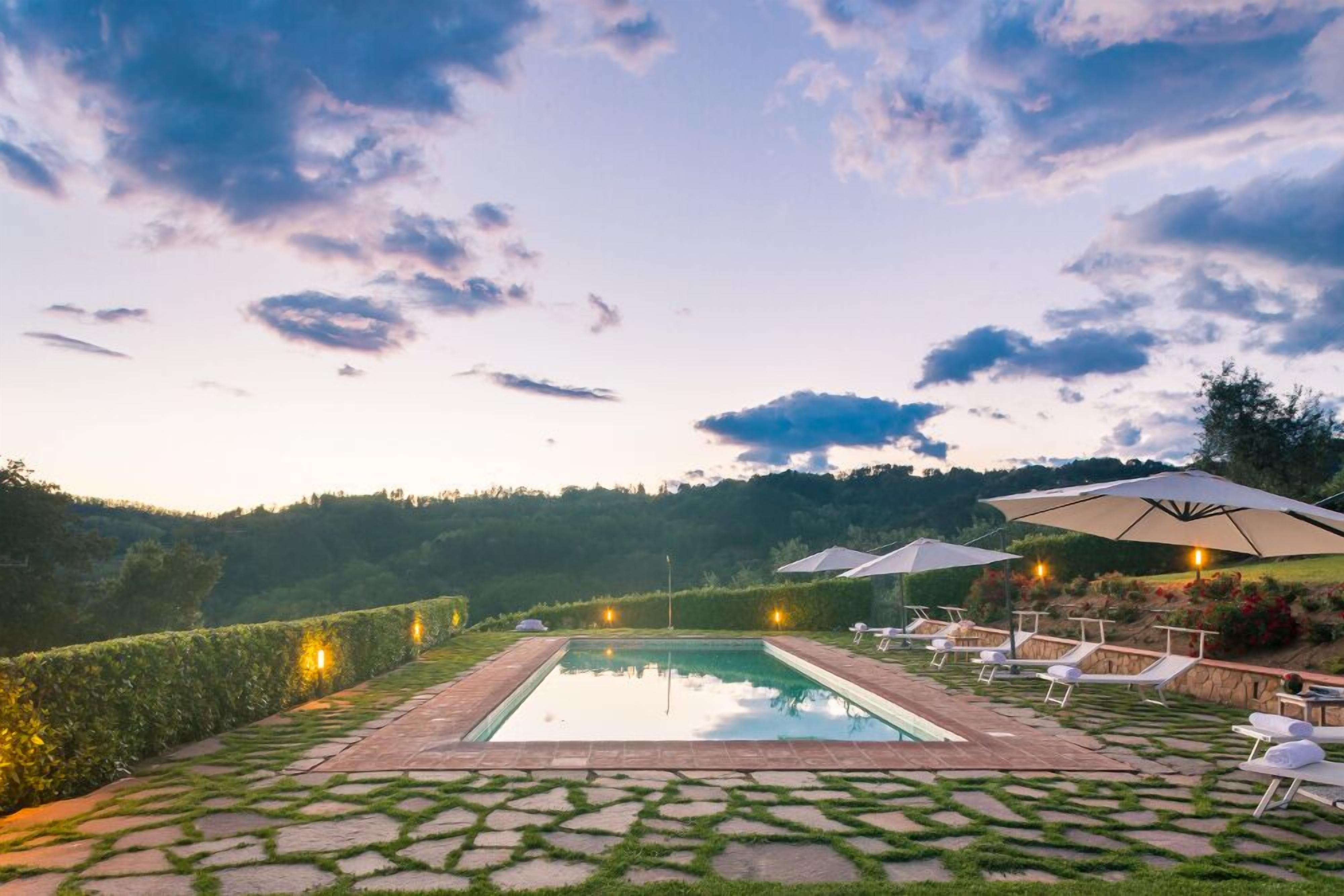 Seasonal outdoor pool, pool umbrellas, pool loungers