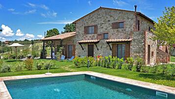 Seasonal outdoor pool, pool umbrellas, pool loungers