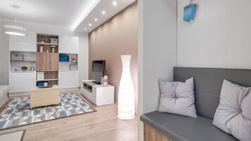 Exclusive Apartment | Living room | Flat-screen TV