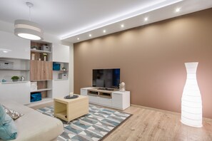 Exclusive-Apartment | Wohnzimmer | Flachbildfernseher