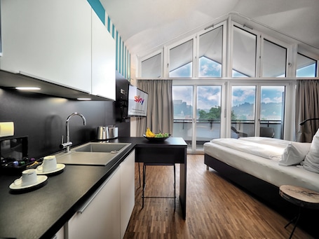 Design Studio, 1 Queen Bed, Non Smoking | In-room safe, individually decorated, individually furnished