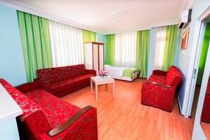 Family Apartment, 1 Bedroom | Living area
