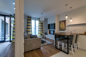 Exclusive Apartment (51) | Living area | Flat-screen TV