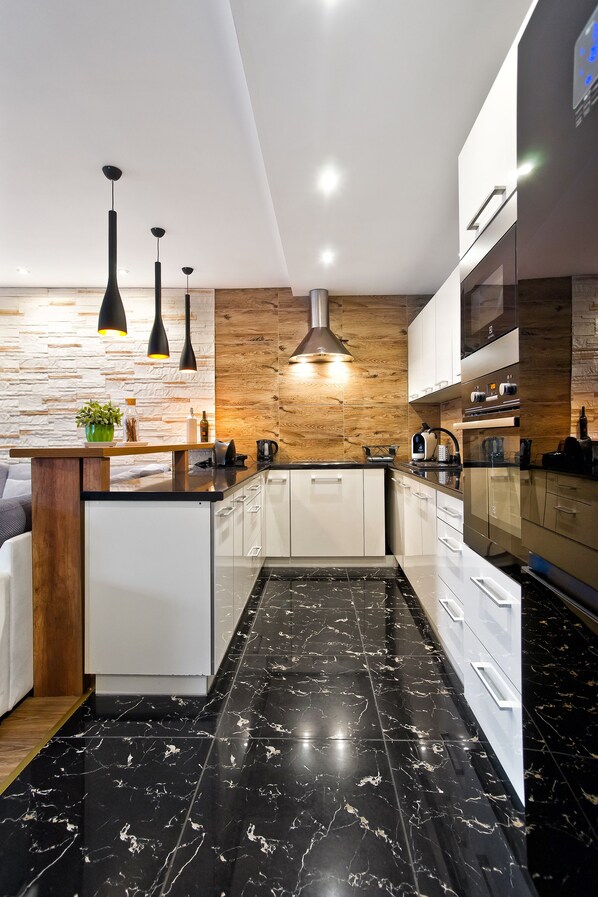 Duplex | Cuisinette privée | Réfrigérateur, un four, surface de cuisson, cafetière-théière