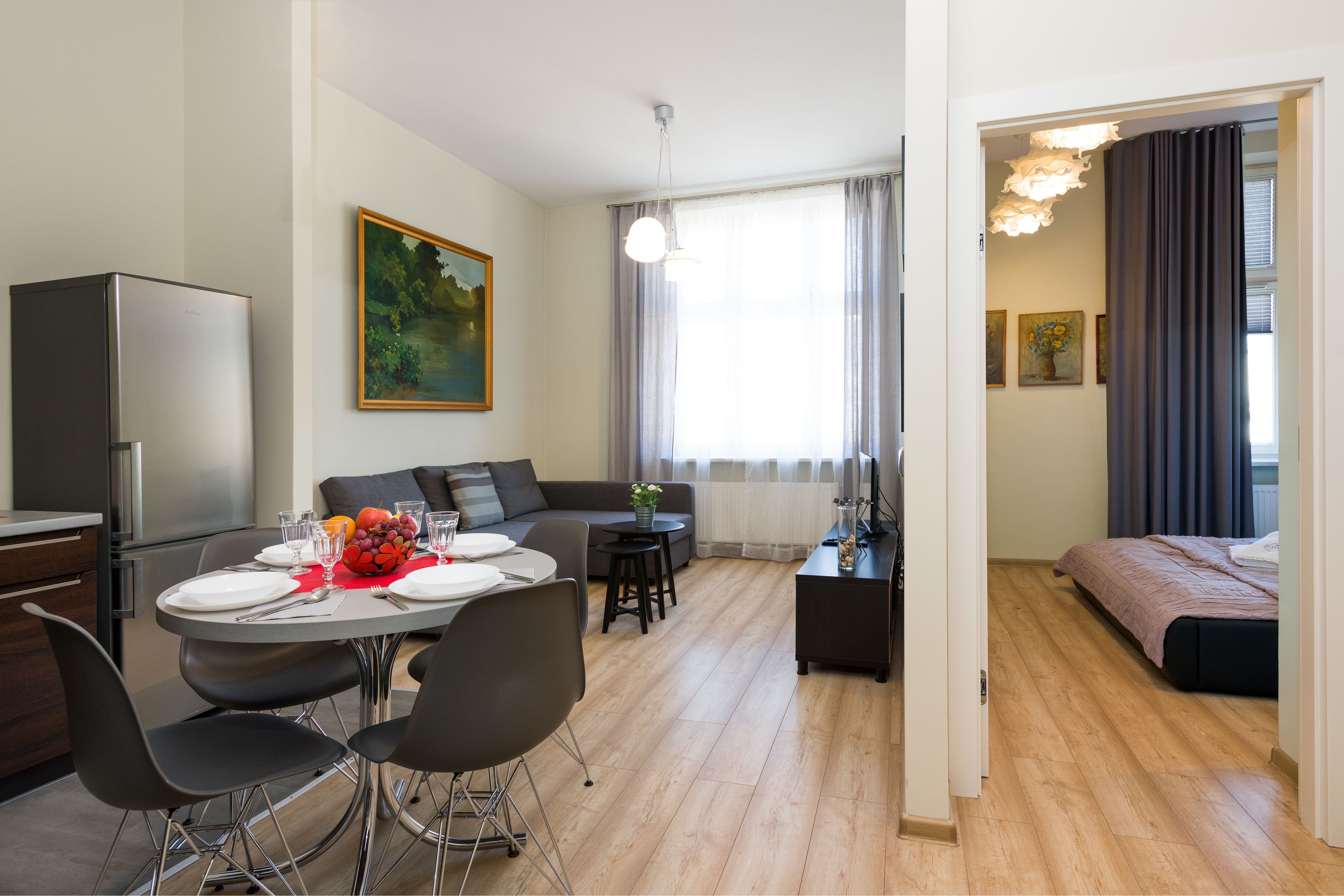 Deluxe Apartment (17) | Living area | Flat-screen TV