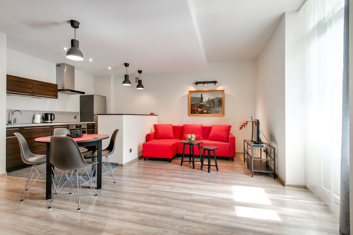 Deluxe Apartment (19) | Living area | Flat-screen TV