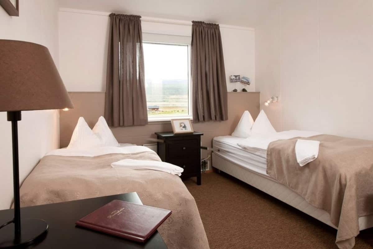 Premium bedding, desk, blackout drapes, soundproofing
