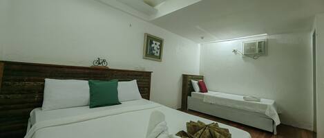 Deluxe Triple Room | Bed sheets