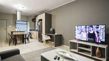 Luxury Apartment, 2 Bedrooms, Non Smoking | Living area | 50-inch LED TV with satellite channels, TV