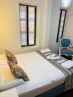 Desk, free WiFi, bed sheets
