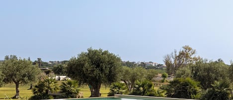 Outdoor pool, open 9:00 AM to 8:00 PM, sun loungers