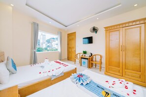 Deluxe Triple Room, 1 Bedroom, Sea View | Minibar, desk, blackout curtains, soundproofing - Lang Chai Hotel (Hai Phong)