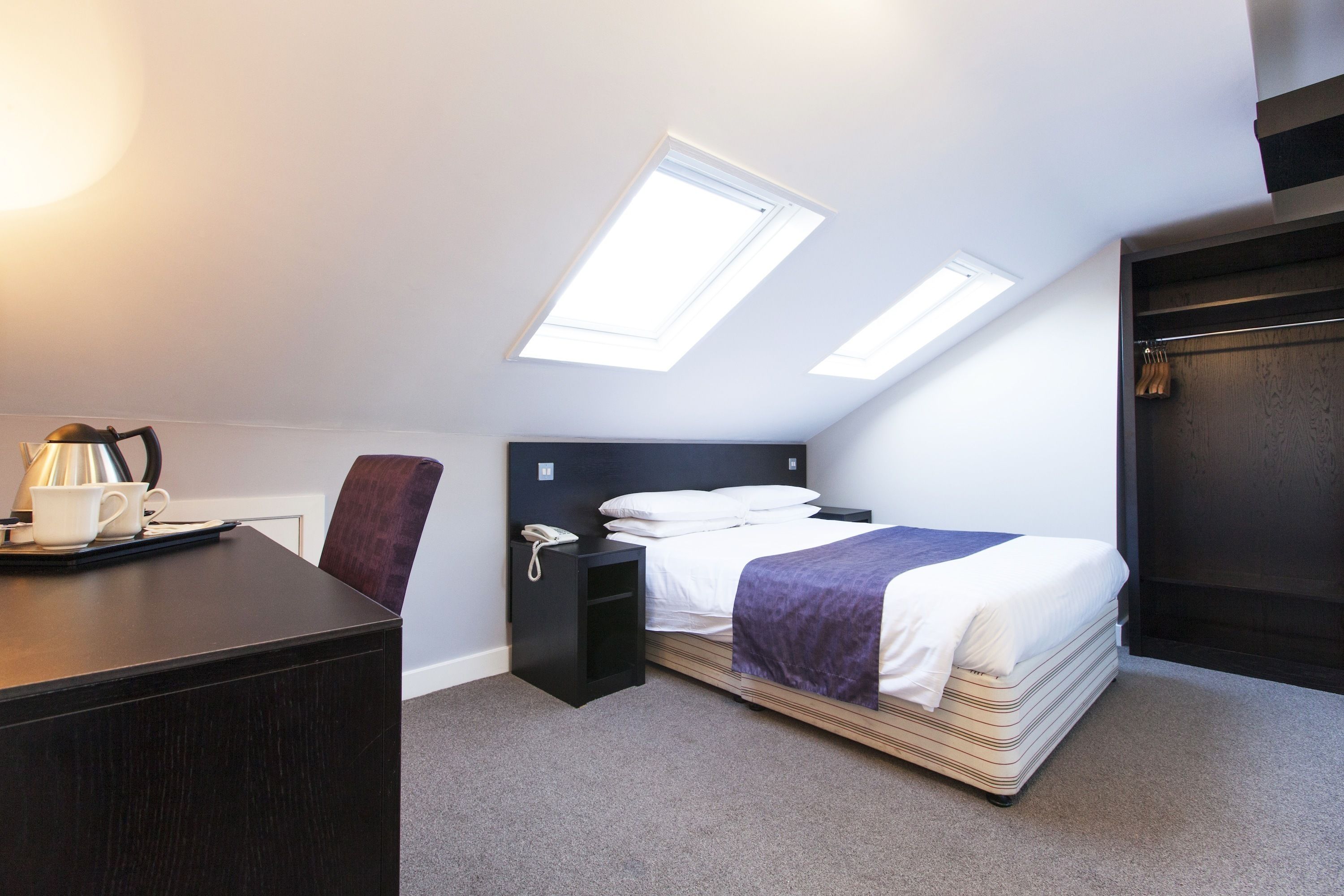 family room | desk, blackout curtains, iron/ironing board, free wifi