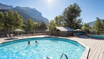 Seasonal outdoor pool, pool umbrellas, sun loungers