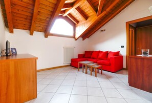 Appartamento, 1 camera da letto, non fumatori | Area soggiorno | TV a schermo piatto