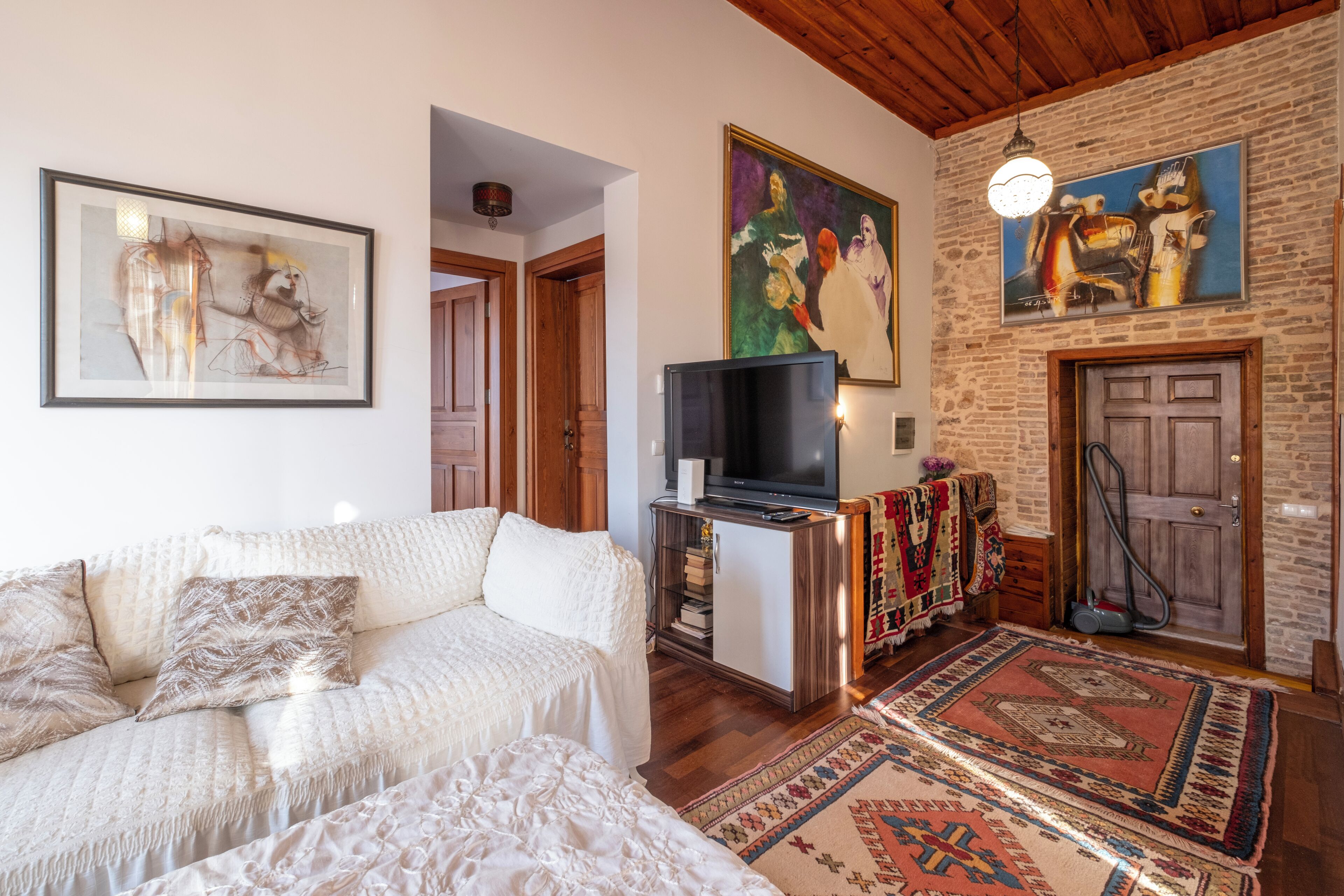 family condo, 2 bedrooms, sea view, courtyard area | living area | 180-inch smart tv with digital channels, tv, netflix