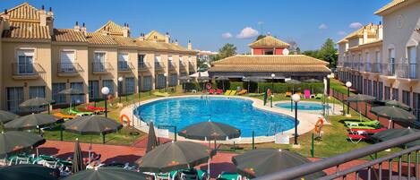 Indoor pool, seasonal outdoor pool, pool umbrellas, sun loungers