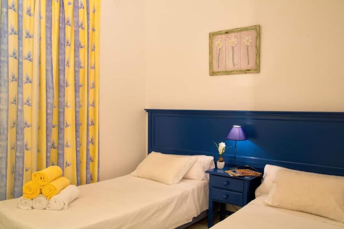 2 bedrooms, desk, laptop workspace, iron/ironing board