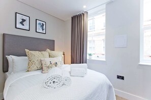 Appartement économique | 2 chambres, fer et planche à repasser, accès au Wi-Fi (inclus)