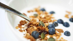 A bowl of granola with blueberries and pumpkin seeds. - Stayeasy Pietermaritzburg (Pietermaritzburg)