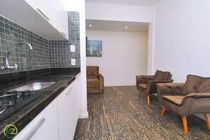 Economy Apartment, Multiple Beds, Non Smoking, Partial Sea View | Living area