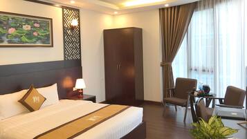 Habitación Deluxe doble, 1 cama de matrimonio grande, vistas a la ciudad | 1 dormitorio, sábanas de algodón egipcio, ropa de cama de alta calidad