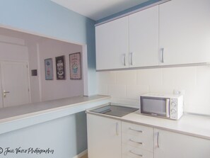 Fridge, microwave, coffee/tea maker, high chair