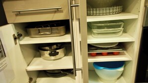 A kitchen with a white refrigerator, a white oven, and a white sink. - Risoul - Duplex 66 - Fully equipped - WIFI - 60m² - Foot of ski slopes (Risoul 1850)