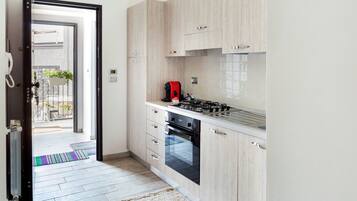 Apartment, 1 Double Bed with Sofa bed | Private kitchen | Full-size fridge, oven, espresso maker, coffee/tea maker