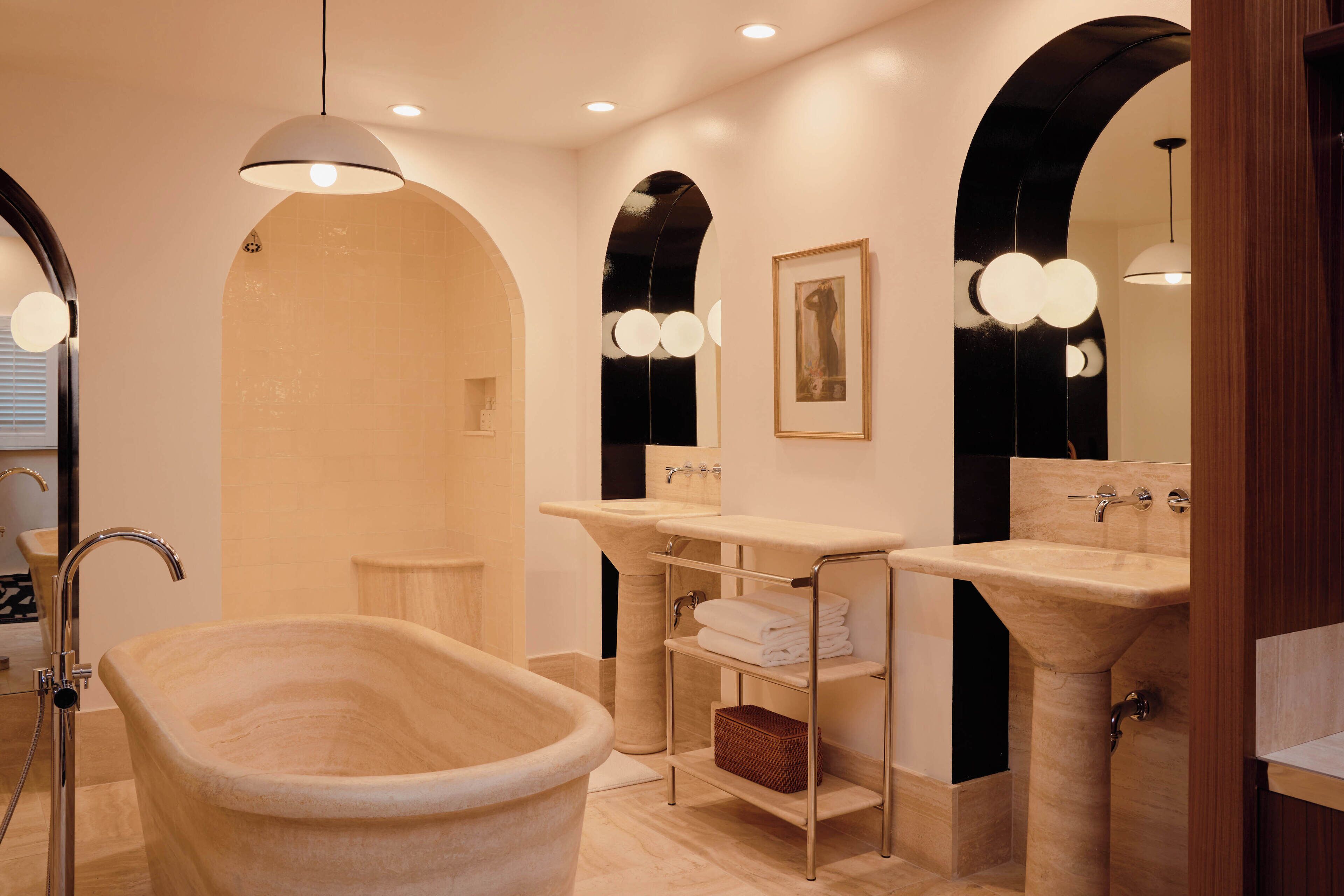 Suite, Multiple Beds | Bathroom | Rainfall showerhead, designer toiletries, hair dryer, bathrobes