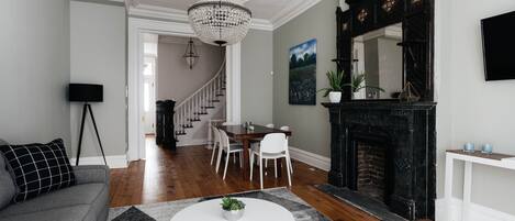 Luxury Townhome, Multiple Beds | Living area | 42-inch LED TV with cable channels, TV, Netflix