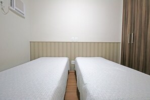 2 habitaciones, tabla de planchar con plancha, wifi y ropa de cama