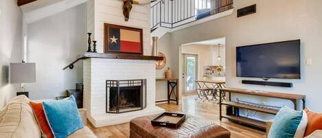 Smart TV, fireplace, books