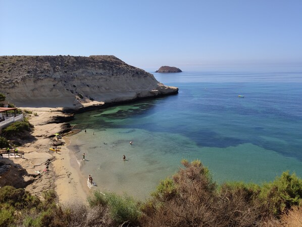 Beach nearby, sun loungers